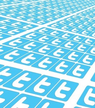 Logotipos de pájaros azules de Twitter en un patrón repetido sobre un fondo blanco.