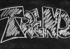 La palabra "TREND" está escrita en letras grandes, similares a las de tiza, sobre un fondo de pizarra.
